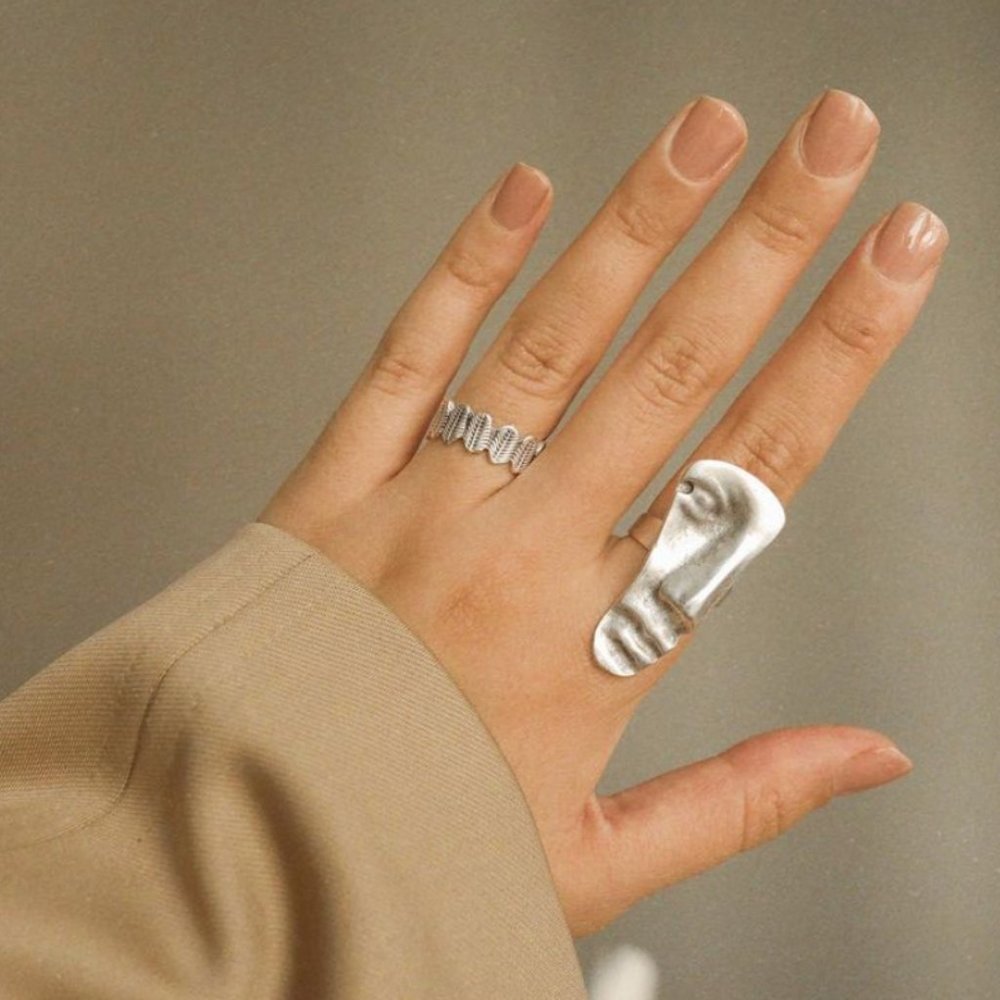 Antique silver plated face blogger ring